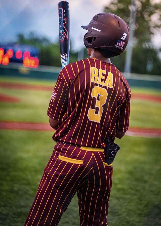 Close-up of baseball player number 3 holding a bat